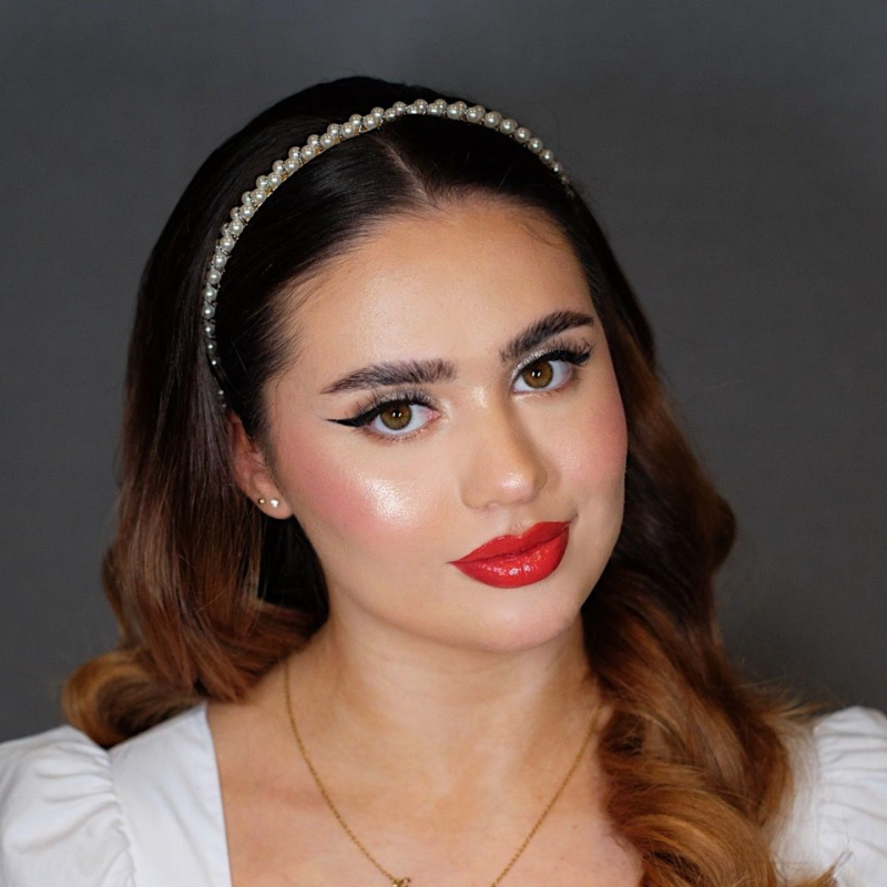 Image of bridal makeup by Gia MUA: natural look with red lips and catflick 